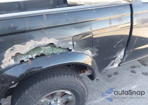 1999 Nissan Frontier Se-V6/Xe-V6 z USA, uszkodzony, nr VIN 1N6ED26Y2XC309915